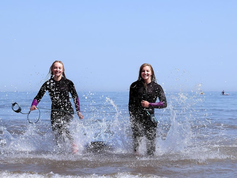 Paddleboarders Georgian Dobbs and Lana Coopland