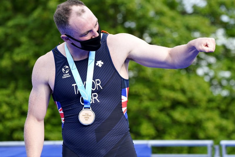 Michael Taylor celebrates with silver in the PTS4 Mens event during the AJ Bell 2021 World Triathlon Para Series race in Roundhay Park, Leeds (photo: PA Wire/ Danny Lawson)