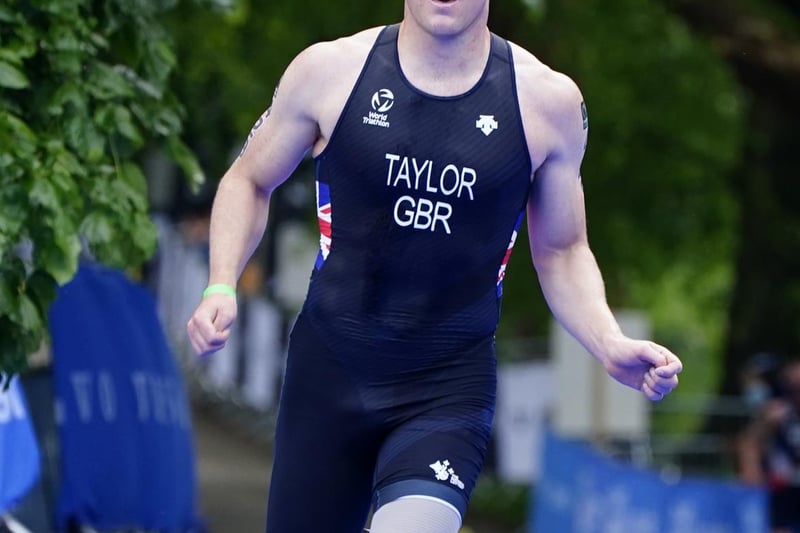 Michael Taylor crosses the line during the AJ Bell 2021 World Triathlon Para Series race in Roundhay Park, Leeds. (photo: PA Wire/ Danny Lawson)