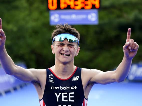 Great Britain's Alex Yee celebrates winning The AJ Bell 2021 World Triathlon Championship Series Mens Race during day 2 of the 2021 ITU World Triathlon Series Event in Leeds. (photo: PA Wire/ Danny Lawson)