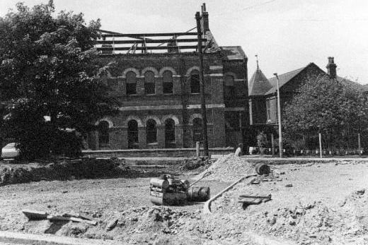 The demolition of the Congregational School. This building, on Back Northgate, was pulled down to make way for Stuart Road.