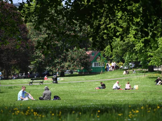 People making the most of the sun on the Stray in Harrogate.
