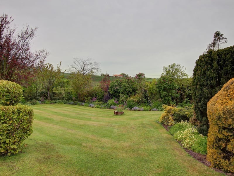 Lawned garden with well-stocked borders