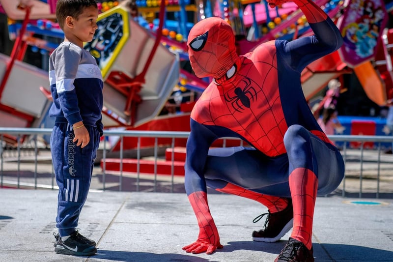 Lancaster Superhero event in Market Square. One young fan comes face to face with Spiderman. Picture by Martin Bostock.