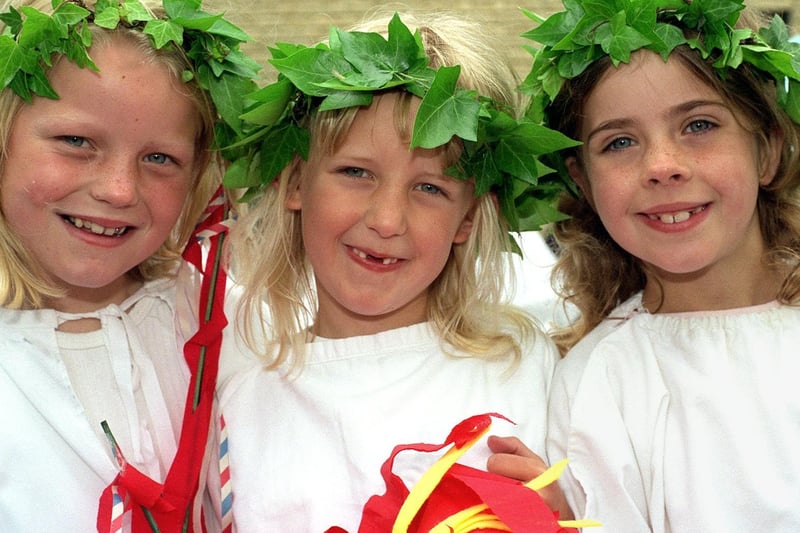 Three members of St Oswald's Brownies and Rainbows group walk in the Carnival parade in June 1996. Pictured, from left, are Laura Butterfield, Amy Claughton and Sian Hughes.