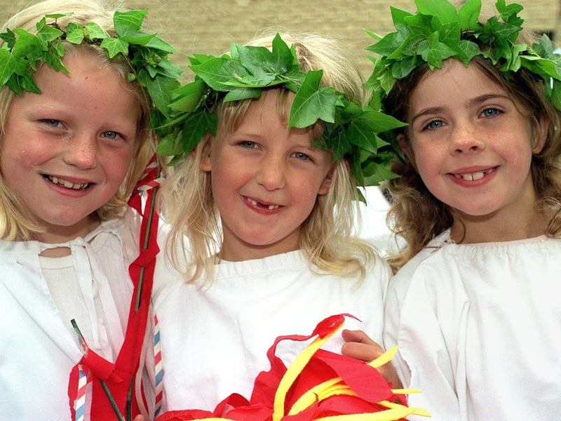 Three members of St Oswald's Brownies and Rainbows group walk in the Carnival parade in June 1996. Pictured, from left, are Laura Butterfield, Amy Claughton and Sian Hughes.