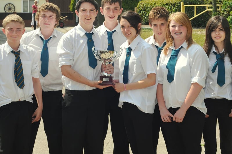 Scalby School swimming team with their trophy, from left, Tom Heaton, Sam Sedman, Ollie Richardson, Jack Harness, Becky Cox, Aaron Pattison, Nicki Deaves and Emily Fuller.