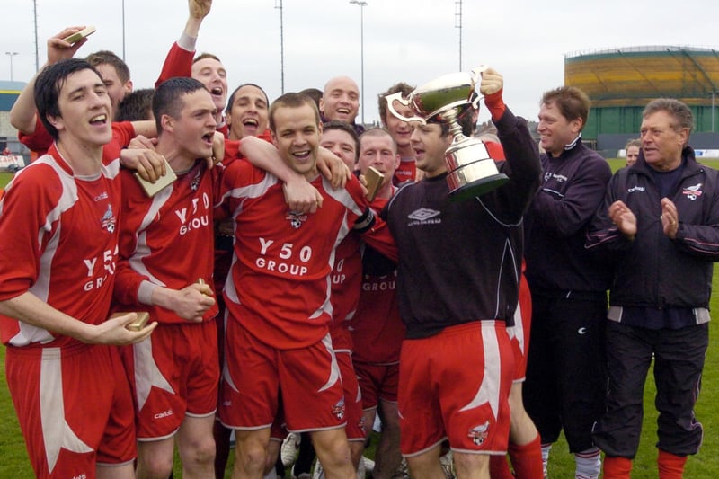 Scarborough Athletic celebrate winning the NCEL Trophy.