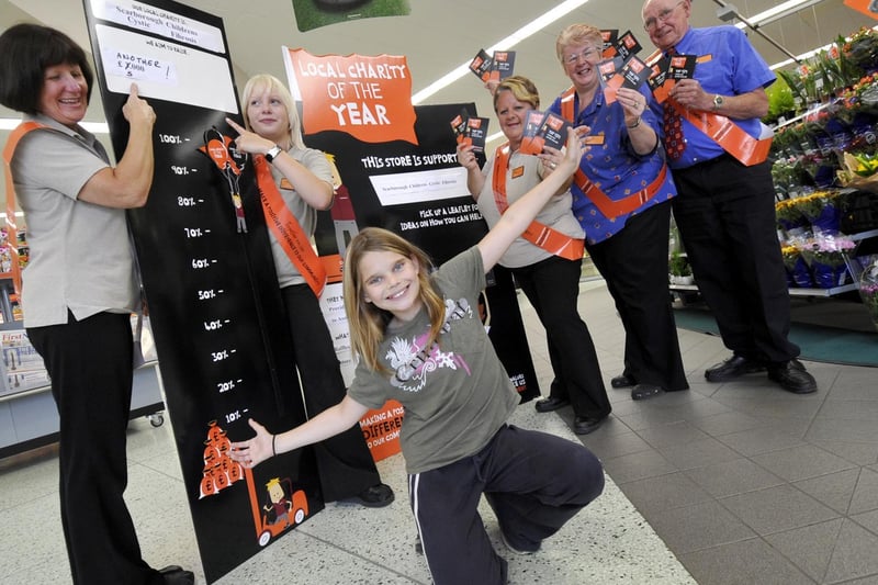 Ellie Tattersall, front, thanks Sainsbury’s for raising £3,000 for the Scarborough Children’s Cystic Fibrosis charity.