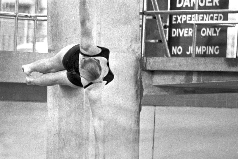 Swimmers watch expert divers at the main pool at Wigan International Pool in 1974