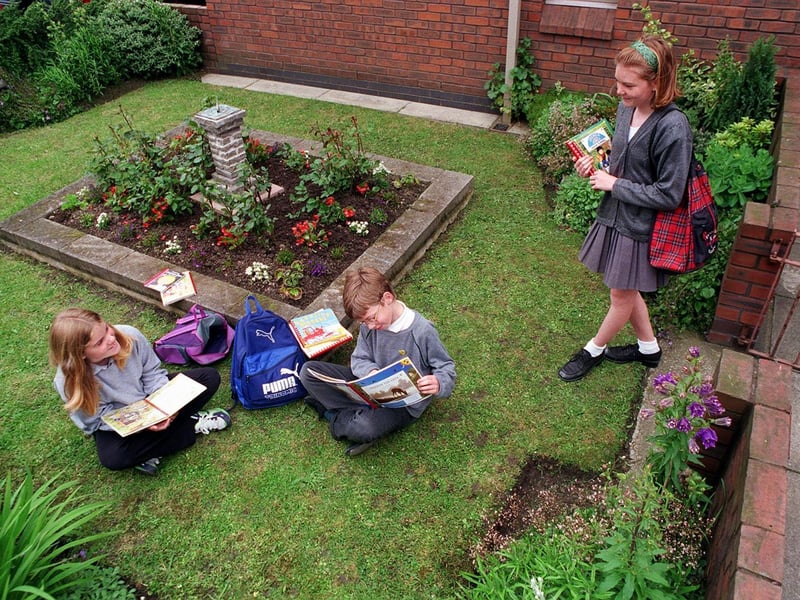 Pupils from White Laith Primary enjoy the school's 'Heather Garden' Pictured are Natalie McLean, Nicholas Wilson and Sarah Bastow.