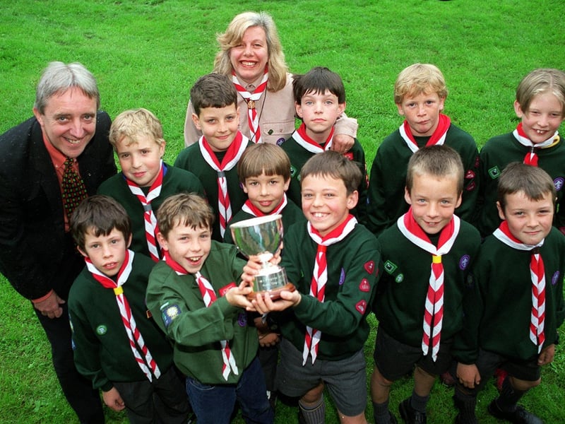 Bardsey Cub scouts had this trophy presented to them by Gordon Russell (left), treasuer of the Leeds Branch of the National Asthma Society.