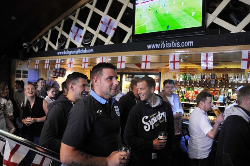 Football fans fill Itis Itis bar to watch the first Euro 2012 England game, England v France.