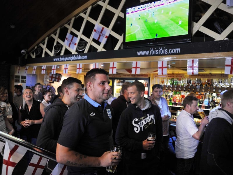 Football fans fill Itis Itis bar to watch the first Euro 2012 England game, England v France.