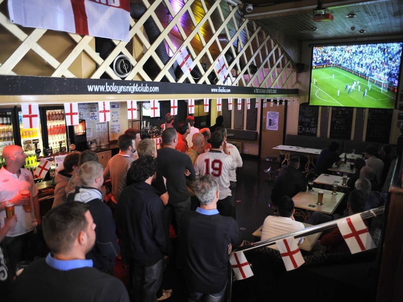 Football fans fill Itis Itis bar to watch the first Euro 2012 England game, England v France.
