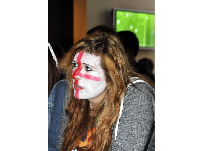An England fan watching the England v Ukraine Euro 2012 game, in The Barbican.