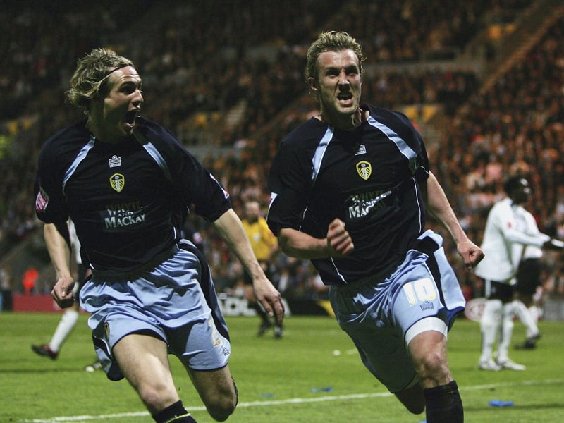 Striker Rob Hulse celebrates with Matthew Kilgallon after scoring the opening goal.
