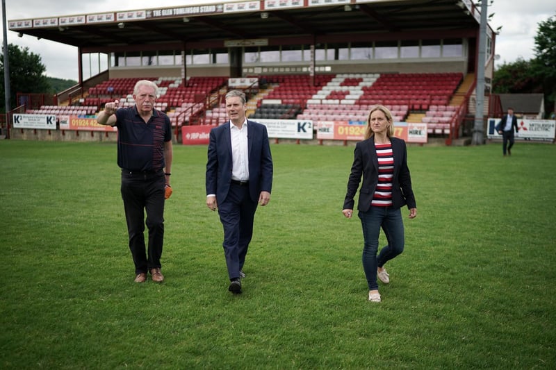 Sir Keir Starmer and Batley and Spen by-election candidate Kim Leadbeater tour Batley Bulldogs' stadium with club chairman Kevin Nicholas. Photo: Getty Images