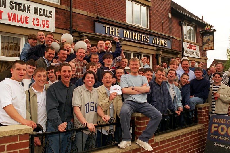 These lads were Benidorm-bound for a four-day stag do with Lee Mullins (centre) who was getting married. They are pictured leaving their local The Miners Arms in May 1996.