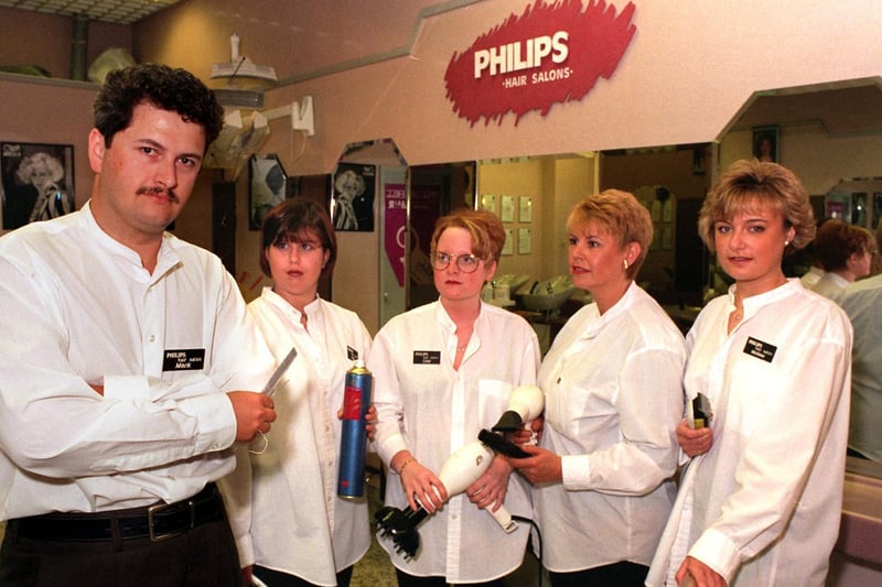 Did you get your hair cut here back in the day? Pictured is manager Mark Betts and some of the staff at Philips Hair Salon within Asda's Morley store.