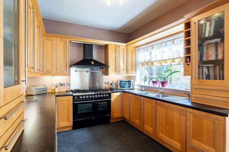 To the left is the kitchen which has been renovated with modern worktops and units and has a double range gas cooker.The kitchen leads straight through to the family room.