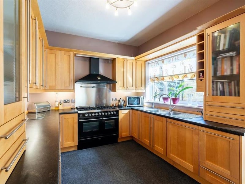To the left is the kitchen which has been renovated with modern worktops and units and has a double range gas cooker.The kitchen leads straight through to the family room.