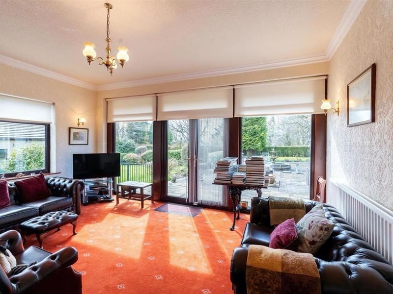 The family room is a large space filled with the light due to the french patio doors leading straight into the garden. It is the perfect place to relax with family.