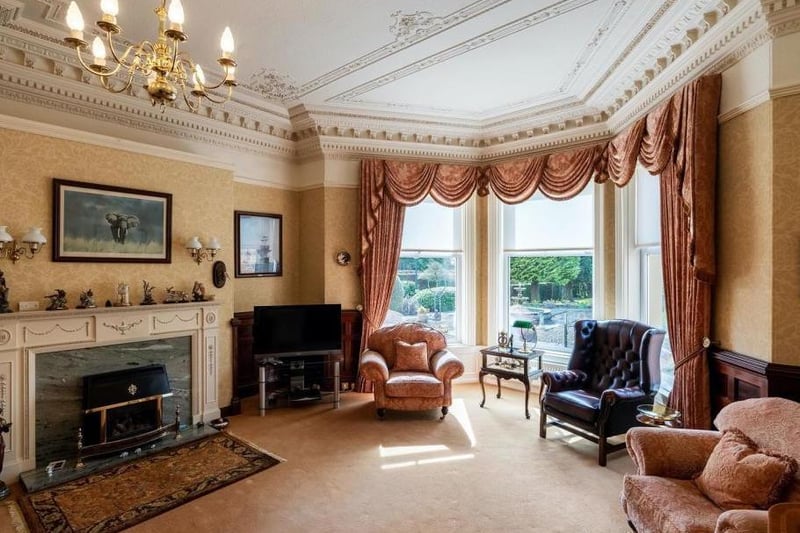 Also in this part of the property is the magnificent lounge room, which oozes grandeur. It used to form part ofball room which is very evident when due tothe size and impressive character features in place which include ornate plaster ceiling rose, fabulous layered coving and picture rail, painted ceiling detail, oak wall panelling, feature fireplace with marble back and inset fire.. The large bay window frames the impressive garden view.