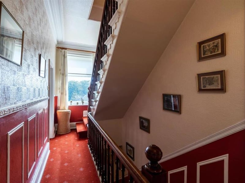 The staircase leads to the upper floors.