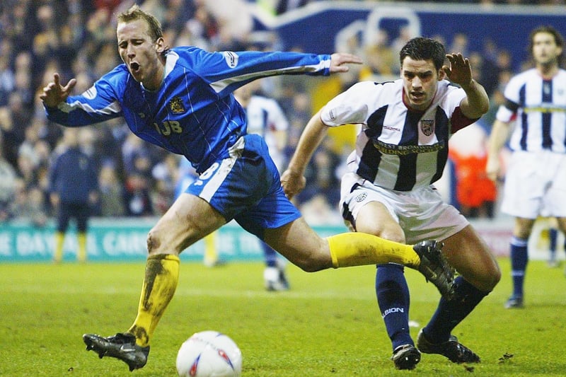 WALES - Neil Roberts, left, during the Nationwide Division One match between West Bromwich Albion and Wigan Athletic at The Hawthorns on March 16, 2004.