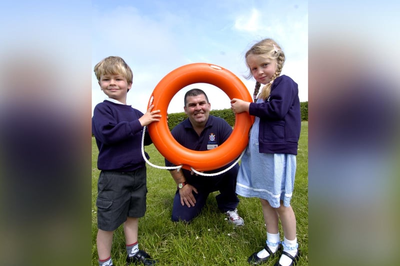 Pupils from Seton School with water-safety advisor Paul Waugh.