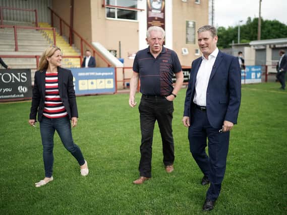 Labour party leader Sir Keir Starmer and Batley and Spen by-election candidate Kim Leadbeater tour Batley Bulldogs' stadium with club chairman Kevin Nicholas. Photo: Getty Images