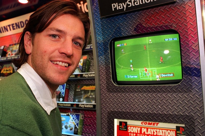 Leeds United star Lee Sharpe visited Birstall's Comet store to play football in the PlayStation in October 1997.