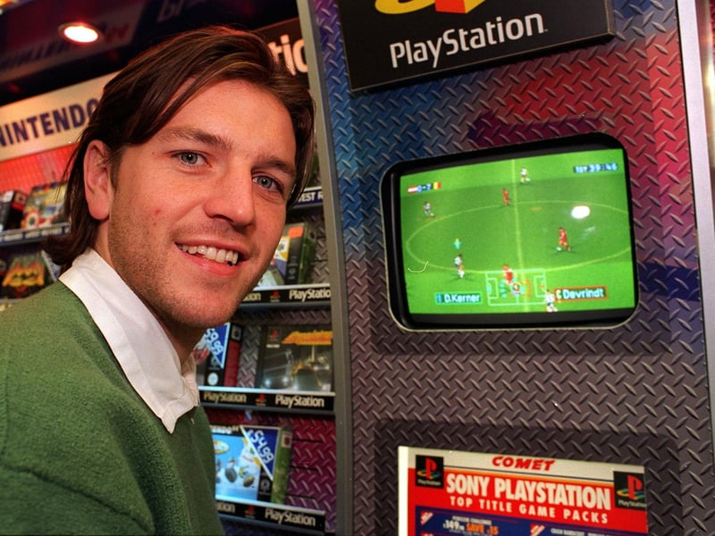 Leeds United star Lee Sharpe visited Birstall's Comet store to play football in the PlayStation in October 1997.