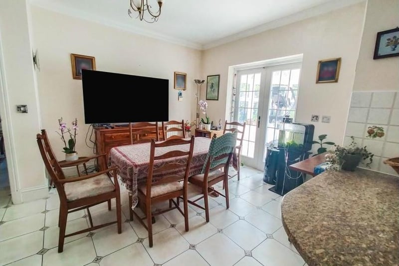 A spacious family dining room and open plan kitchen is ideal for both informal dining and entertaining. Double doors from the family dining area open to the conservatory, which benefits from views of the garden.