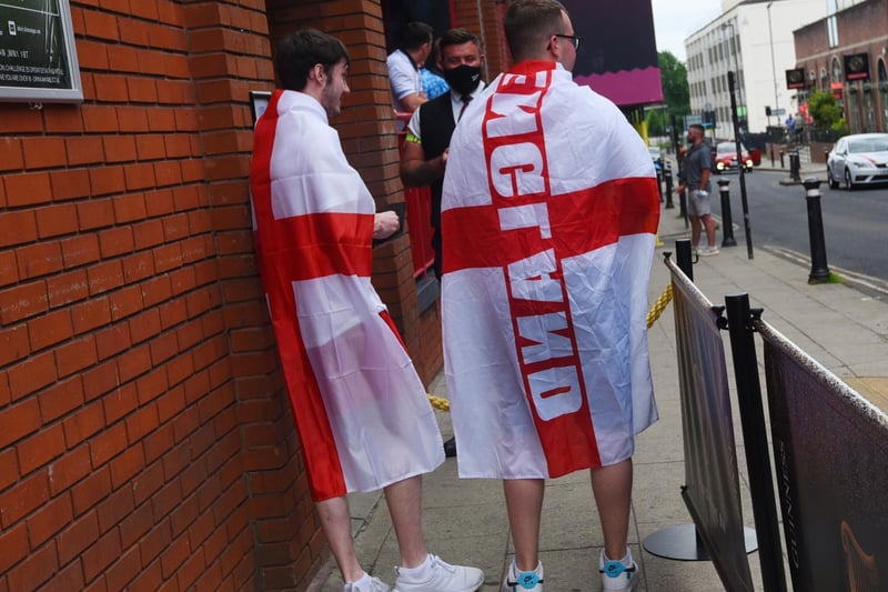 Fans flying the England flag.