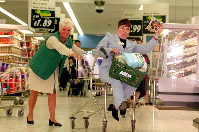Star of TV's Driving School Maureen Rees tries out one of Asda's new trolleys with the help of worker Gwen Johnson.