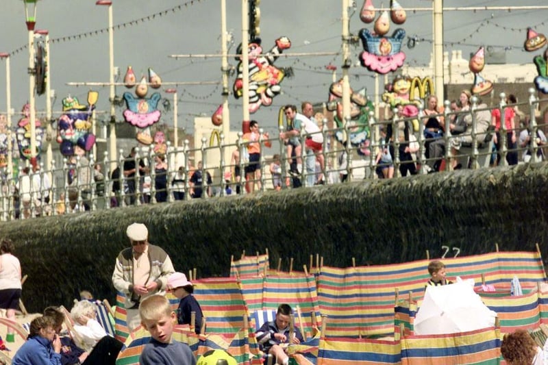 Deckchairs and matching stripes of windbreakers in 1998. Pic: PA