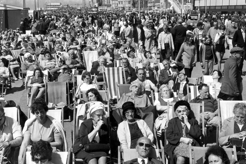 Every deckchair was taken in this classic picture of Blackpool promenade on a Whit Monday in the 1960s