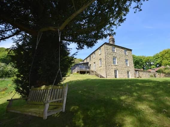 The country house in its elevated, rural setting