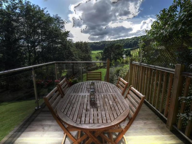 A decked area to enjoy sitting out to eat al fresco and admire the view