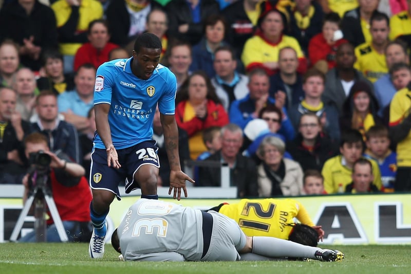 Striker Dominic Poleon reacts as he looks at injured Watford goalkeeper Jonathan Bond.