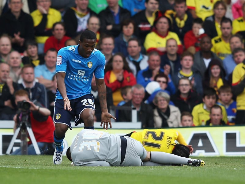 Striker Dominic Poleon reacts as he looks at injured Watford goalkeeper Jonathan Bond.
