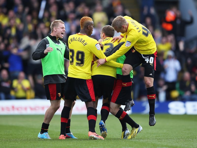 Watford's Almen Abdi is mobbed by team mates after equalising.