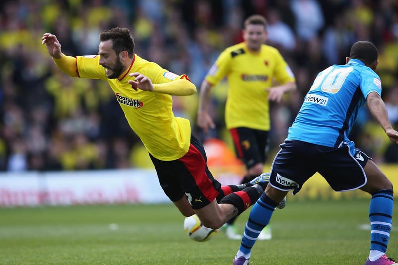 Watford's Marco Cassetti goes to ground after a challenge by Ryan Hall.