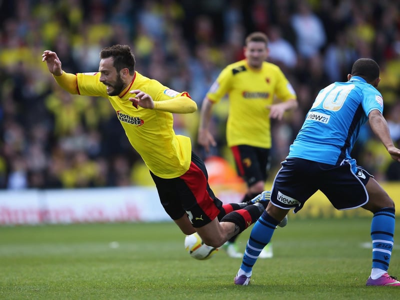 Watford's Marco Cassetti goes to ground after a challenge by Ryan Hall.