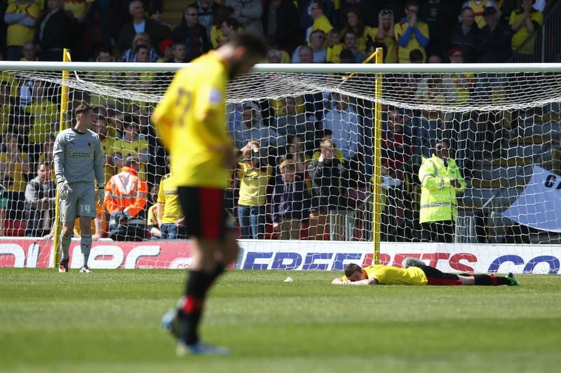 Replacement  Watford goalkeeper Jack Bonham looks dejected with teammates after Ross McCormack's late goal.