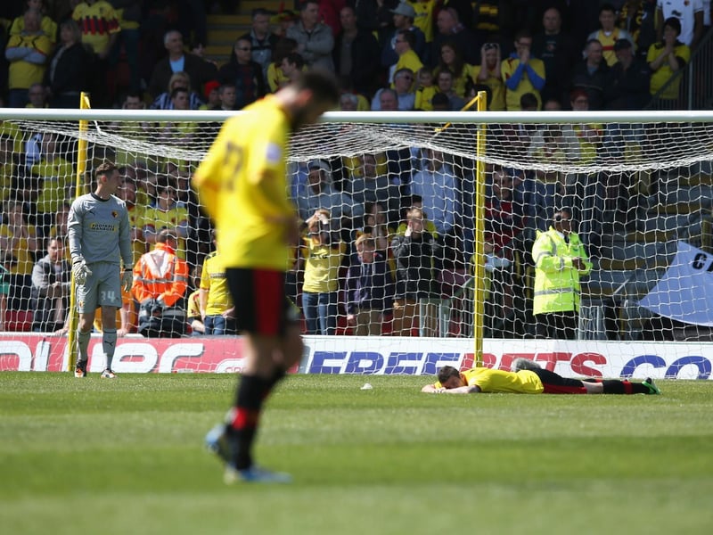 Replacement Watford goalkeeper Jack Bonham looks dejected with teammates after Ross McCormack's late goal.