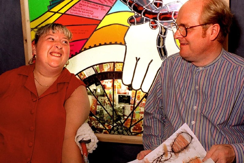 This photographic mosaic named 'Spontaneity' was produced at art festival Create 96  held at Armley Resource Centre in August 1996. Pictured is artist Stuart Bolton with project worker Gaynor Chilvers.