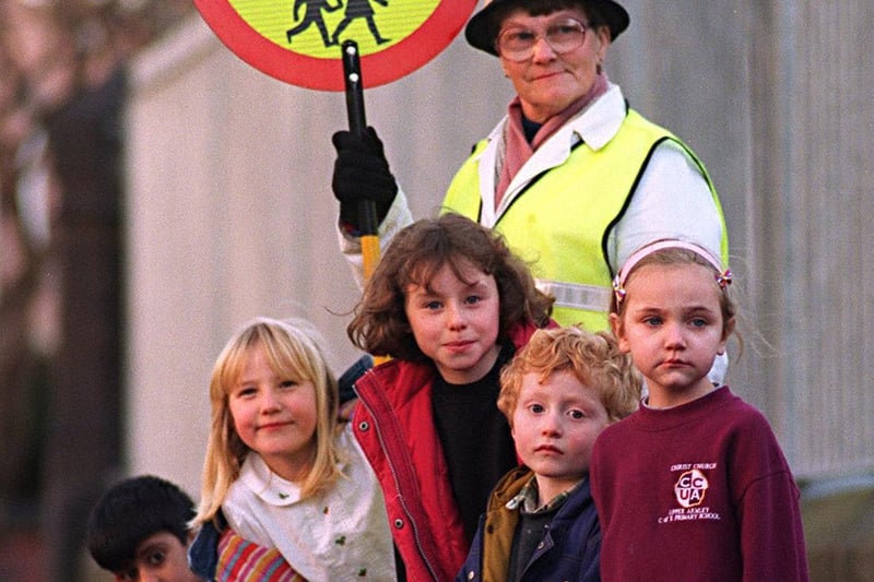 Lollipop lady Dorothy Hodgson was retiring after working for 20 years at Christ Church Upper Armley C of E Primary. She is pictured with pupils Asum Yousaf, Cara Wilkinson, Jodie McCann, Bren Dooher and Lucy Callaghan.